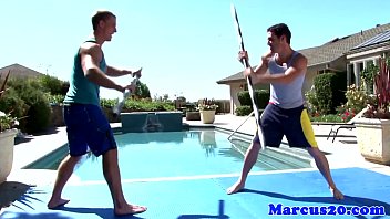 Gay Muscular Jocks Sword Fighting By The Pool free video